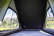 Camp King Aluminum Roof Top Tent Interior details of insulated roof and mesh windows