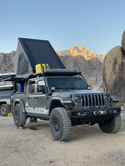 Jeep Gladiator at campsite with CampKing Outback Canopy Camper Solar Panel